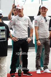 10.04.2011 Sepang, Malaysia,  Nico Rosberg (GER), Mercedes GP and Michael Schumacher (GER), Mercedes GP  - Formula 1 World Championship, Rd 02, Malaysian Grand Prix, Sunday Race