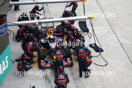 10.04.2011 Sepang, Malaysia,  Sebastian Vettel (GER), Red Bull Racing  pit stop - Formula 1 World Championship, Rd 02, Malaysian Grand Prix, Sunday Race