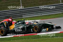 10.04.2011 Sepang, Malaysia,  Jarno Trulli (ITA), Team Lotus and Timo Glock (GER), Virgin Racing  - Formula 1 World Championship, Rd 02, Malaysian Grand Prix, Sunday Race
