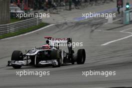 10.04.2011 Sepang, Malaysia,  Rubens Barrichello (BRA), Williams F1 Team hits by a puncture  - Formula 1 World Championship, Rd 02, Malaysian Grand Prix, Sunday Race