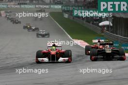 10.04.2011 Sepang, Malaysia,  Felipe Massa (BRA), Scuderia Ferrari and Vitaly Petrov (RUS), Lotus Renalut F1 Team  - Formula 1 World Championship, Rd 02, Malaysian Grand Prix, Sunday Race