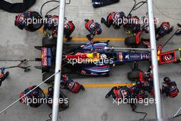10.04.2011 Sepang, Malaysia,  Sebastian Vettel (GER), Red Bull Racing pit stop - Formula 1 World Championship, Rd 02, Malaysian Grand Prix, Sunday Race
