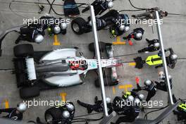 10.04.2011 Sepang, Malaysia,  Michael Schumacher (GER), Mercedes GP Petronas F1 Team pit stop - Formula 1 World Championship, Rd 02, Malaysian Grand Prix, Sunday Race