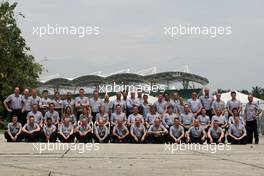 10.04.2011 Sepang, Malaysia,  Pirelli crew group picture - Formula 1 World Championship, Rd 02, Malaysian Grand Prix, Sunday Race