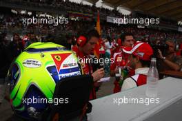 10.04.2011 Sepang, Malaysia,  Felipe Massa (BRA), Scuderia Ferrari with his friends name on his helmet who passed away - Formula 1 World Championship, Rd 02, Malaysian Grand Prix, Sunday Race