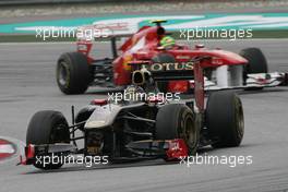 10.04.2011 Sepang, Malaysia,  Nico Hulkenberg (GER), Test Driver, Force India and Felipe Massa (BRA), Scuderia Ferrari  - Formula 1 World Championship, Rd 02, Malaysian Grand Prix, Sunday Race