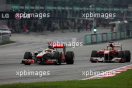 10.04.2011 Sepang, Malaysia,  Lewis Hamilton (GBR), McLaren Mercedes and Fernando Alonso (ESP), Scuderia Ferrari  - Formula 1 World Championship, Rd 02, Malaysian Grand Prix, Sunday Race