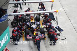 10.04.2011 Sepang, Malaysia,  Sebastian Vettel (GER), Red Bull Racing  pit stop - Formula 1 World Championship, Rd 02, Malaysian Grand Prix, Sunday Race