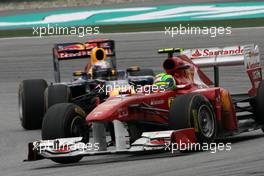 10.04.2011 Sepang, Malaysia,  Felipe Massa (BRA), Scuderia Ferrari and Sebastian Vettel (GER), Red Bull Racing  - Formula 1 World Championship, Rd 02, Malaysian Grand Prix, Sunday Race