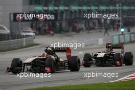 10.04.2011 Sepang, Malaysia,  Vitaly Petrov (RUS), Lotus Renalut F1 Team and Nick Heidfeld (GER), Lotus Renault F1 Team  - Formula 1 World Championship, Rd 02, Malaysian Grand Prix, Sunday Race