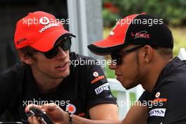09.04.2011 Sepang, Malaysia,  Jenson Button (GBR), McLaren Mercedes and Lewis Hamilton (GBR), McLaren Mercedes  - Formula 1 World Championship, Rd 02, Malaysian Grand Prix, Saturday
