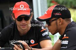 09.04.2011 Sepang, Malaysia,  Jenson Button (GBR), McLaren Mercedes and Lewis Hamilton (GBR), McLaren Mercedes  - Formula 1 World Championship, Rd 02, Malaysian Grand Prix, Saturday