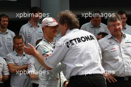 10.04.2011 Sepang, Malaysia,  Michael Schumacher (GER), Mercedes GP Petronas F1 Team and Norbert Haug (GER), Mercedes, Motorsport chief - Formula 1 World Championship, Rd 02, Malaysian Grand Prix, Sunday
