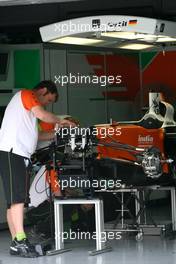 07.04.2011 Sepang, Malaysia,  Force India F1 Team mechanic - Formula 1 World Championship, Rd 02, Malaysian Grand Prix, Thursday
