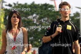 23.09.2011 Singapore, Singapore,  Romain Grosjean (FRA) , Lotus Renault GP and his girlfriend Marion Joles (FRA) - Formula 1 World Championship, Rd 14, Singapore Grand Prix, Friday