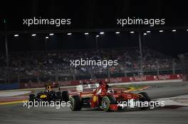 25.09.2011 Singapore, Singapore, Fernando Alonso (ESP), Scuderia Ferrari leads Mark Webber (AUS), Red Bull Racing  - Formula 1 World Championship, Rd 14, Singapore Grand Prix, Sunday Race