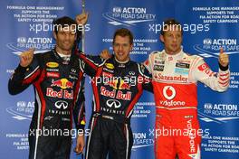 24.09.2011 Singapore, Singapore, qualifying results, 2nd Mark Webber (AUS), Red Bull Racing, 1st Sebastian Vettel (GER), Red Bull Racing and 3rd Jenson Button (GBR), McLaren Mercedes  - Formula 1 World Championship, Rd 14, Singapore Grand Prix, Saturday Qualifying