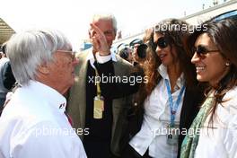 08.05.2011 Istanbul, Turkey,  Bernie Ecclestone (GBR) with Afef Jnifen (wife of Marco Tronchetti Provera (ITA), Pirelli's President)  - Formula 1 World Championship, Rd 04, Turkish Grand Prix, Sunday Pre-Race Grid