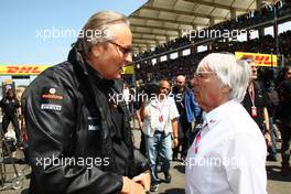 08.05.2011 Istanbul, Turkey,  Mansour Ojeh, Commercial Director of the TAG McLaren with Bernie Ecclestone (GBR) - Formula 1 World Championship, Rd 04, Turkish Grand Prix, Sunday Pre-Race Grid