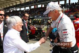 08.05.2011 Istanbul, Turkey,  Bernie Ecclestone (GBR) with Dr. Dieter Zetsche (GER), Chairman of Daimler - Formula 1 World Championship, Rd 04, Turkish Grand Prix, Sunday Pre-Race Grid