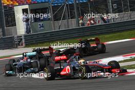 08.05.2011 Istanbul, Turkey,  Lewis Hamilton (GBR), McLaren Mercedes leads Michael Schumacher (GER), Mercedes GP Petronas F1 Team - Formula 1 World Championship, Rd 04, Turkish Grand Prix, Sunday Race