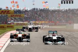 08.05.2011 Istanbul, Turkey,  Michael Schumacher (GER), Mercedes GP Petronas F1 Team, MGP W02 leads Adrian Sutil (GER), Force India F1 Team, VJM-04 - Formula 1 World Championship, Rd 04, Turkish Grand Prix, Sunday Race