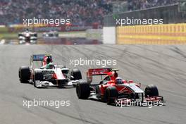 08.05.2011 Istanbul, Turkey,  Jérôme d'Ambrosio (BEL), Marussia Virgin Racing leads Vitantonio Liuzzi (ITA), Hispania Racing Team, HRT - Formula 1 World Championship, Rd 04, Turkish Grand Prix, Sunday Race