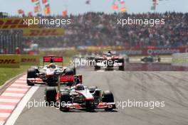 08.05.2011 Istanbul, Turkey,  Jenson Button (GBR), McLaren Mercedes, MP4-26 leads Lewis Hamilton (GBR), McLaren Mercedes, MP4-26 - Formula 1 World Championship, Rd 04, Turkish Grand Prix, Sunday Race