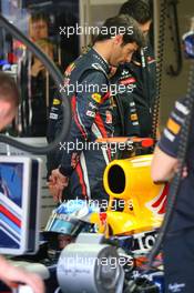 07.05.2011 Istanbul, Turkey,  Mark Webber (AUS), Red Bull Racing looking at the car of Sebastian Vettel (GER), Red Bull Racing - Formula 1 World Championship, Rd 04, Turkish Grand Prix, Saturday Practice