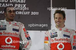 13.11.2011 Abu Dhabi, Abu Dhabi, Lewis Hamilton (GBR), McLaren Mercedes and Jenson Button (GBR), McLaren Mercedes  - Formula 1 World Championship, Rd 18, Abu Dhabi Grand Prix, Sunday Podium
