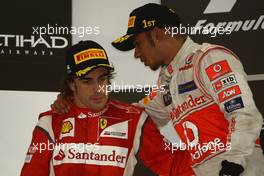 13.11.2011 Abu Dhabi, Abu Dhabi, Fernando Alonso (ESP), Scuderia Ferrari and Lewis Hamilton (GBR), McLaren Mercedes  - Formula 1 World Championship, Rd 18, Abu Dhabi Grand Prix, Sunday Podium