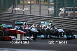 13.11.2011 Abu Dhabi, Abu Dhabi,  Nico Rosberg (GER), Mercedes GP and Michael Schumacher (GER), Mercedes GP  - Formula 1 World Championship, Rd 18, Abu Dhabi Grand Prix, Sunday Race