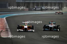 13.11.2011 Abu Dhabi, Abu Dhabi,  Adrian Sutil (GER), Force India and Michael Schumacher (GER), Mercedes GP  - Formula 1 World Championship, Rd 18, Abu Dhabi Grand Prix, Sunday Race