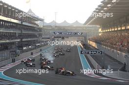 13.11.2011 Abu Dhabi, Abu Dhabi, Sebastian Vettel (GER), Red Bull Racing leads the start of the race  - Formula 1 World Championship, Rd 18, Abu Dhabi Grand Prix, Sunday Race