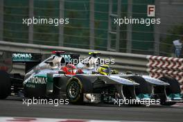 13.11.2011 Abu Dhabi, Abu Dhabi,  Michael Schumacher (GER), Mercedes GP and Nico Rosberg (GER), Mercedes GP  - Formula 1 World Championship, Rd 18, Abu Dhabi Grand Prix, Sunday Race