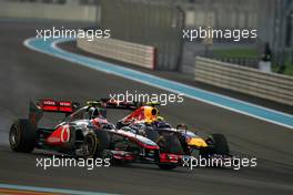 13.11.2011 Abu Dhabi, Abu Dhabi,  Jenson Button (GBR), McLaren Mercedes and Mark Webber (AUS), Red Bull Racing  - Formula 1 World Championship, Rd 18, Abu Dhabi Grand Prix, Sunday Race