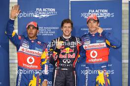 12.11.2011 Abu Dhabi, Abu Dhabi, Lewis Hamilton (GBR), McLaren Mercedes with Sebastian Vettel (GER), Red Bull Racing and Jenson Button (GBR), McLaren Mercedes  - Formula 1 World Championship, Rd 18, Abu Dhabi Grand Prix, Saturday Qualifying