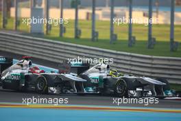 12.11.2011 Abu Dhabi, Abu Dhabi, Michael Schumacher (GER), Mercedes GP Petronas F1 Team and Nico Rosberg (GER), Mercedes GP Petronas F1 Team  - Formula 1 World Championship, Rd 18, Abu Dhabi Grand Prix, Saturday Practice