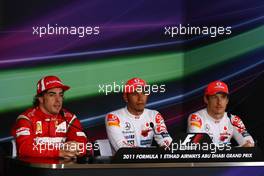 13.11.2011 Abu Dhabi, Abu Dhabi, Fernando Alonso (ESP), Scuderia Ferrari with Lewis Hamilton (GBR), McLaren Mercedes and  Jenson Button (GBR), McLaren Mercedes  - Formula 1 World Championship, Rd 18, Abu Dhabi Grand Prix, Sunday Press Conference