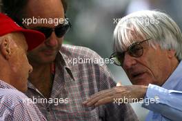 13.11.2011 Abu Dhabi, Abu Dhabi,  Niki Lauda (AUT), Gerhard  Berger (AUT)  and Bernie Ecclestone (GBR)  - Formula 1 World Championship, Rd 18, Abu Dhabi Grand Prix, Sunday