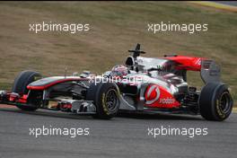 01.02.2011 Valencia, Spain,  Jenson Button (GBR), McLaren Mercedes  in last years car - Formula 1 Testing - Formula 1 World Championship 2011