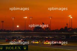 Rolex24 at Daytona 24 hour race Race action at sunset - Grand-Am Rolex SportsCcar Series, Rolex24 at Daytona Beach, USA