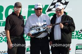 Rolex24 at Daytona 24 hour race DP victory lane: Chip Ganassi and Felix Sabates receive the winning guitar - Grand-Am Rolex SportsCcar Series, Rolex24 at Daytona Beach, USA