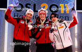26.02.2011, Oslo, Norway (NOR):  (l-r) Andreas Kofler (AUT), Fischer, Thomas Morgenstern (AUT), Fischer and Adam Malysz (POL), Fischer- FIS nordic world ski championships, ski jumping, individual HS106, Oslo (NOR). www.xpb.cc. © Laiho/xpb.cc. Every downloaded picture is fee-liable.