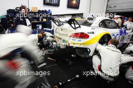 #19 BMW Team Schubert BMW Z4 GT3: Jörg Müller, Dirk Müller, Uwe Alzen, Dirk Adorf in the garage 20.05.2012. ADAC Zurich 24 Hours, Nurburgring, Germany