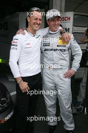 Michael Schumacher (GER) Mercedes Grand Prix with Ralf Schumacher (GER), Team HWA AMG Mercedes, AMG Mercedes C-Coupe 29.04.2012. DTM Round 1, Sunday, Hockenheim, Germany