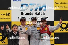 2nd place Bruno Spengler (CAN) BMW Team Schnitzer BMW M3 DTM with 1st place Gary Paffett (GBR), Team HWA AMG Mercedes, AMG Mercedes C-Coupe and 3rd place Mike Rockenfeller (GER) Audi Sport Team Phoenix Racing Audi A5 DTM  20.05.2012. DTM Round 3, Brands Hatch