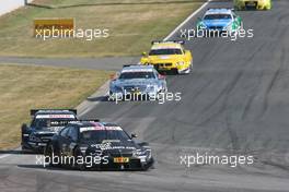 Bruno Spengler (CAN) BMW Team Schnitzer BMW M3 DTM leads Gary Paffett (GBR), Team HWA AMG Mercedes, AMG Mercedes C-Coupe  16.09.2012. DTM Round 8 Sunday, Oschersleben, Germany