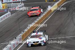 Sunday Round of 16 Martin Tomczyk (GER) BMW Team RMG BMW M3 DTM against Robert Wickens (CAN) Mucke Motorsport AMG Mercedes C-Coupe 15.07.2012. DTM Showevent, Sunday, Muenchen, Germany