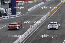 Sunday Round of 16 Martin Tomczyk (GER) BMW Team RMG BMW M3 DTM against Robert Wickens (CAN) Mucke Motorsport AMG Mercedes C-Coupe 15.07.2012. DTM Showevent, Sunday, Muenchen, Germany